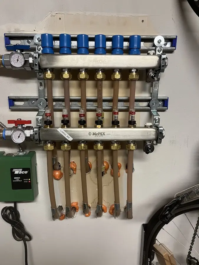 Plumber performing Water Heater Repair at a residential property in Mill Creek